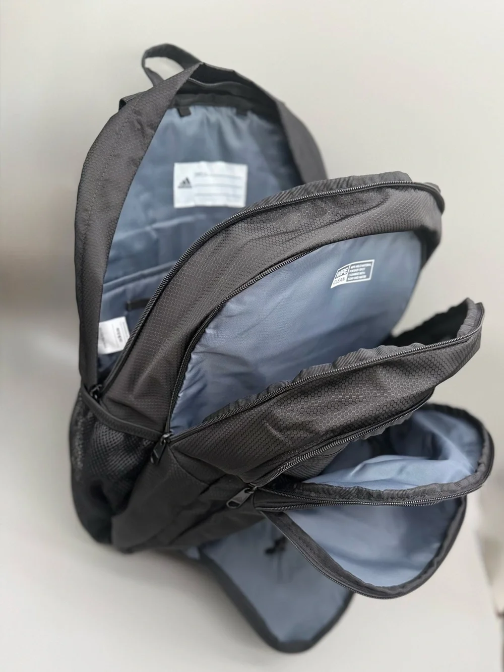 Adidas Black Backpack with Front Organizer and lap top storage.
